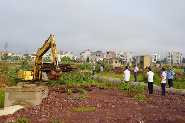 Tổ chức cưỡng chế thu hồi đất thực hiện dự án Khu đô thị Trung tâm xã Đồng Sơn